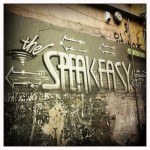the speakeasy written on wall