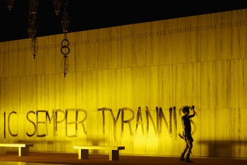 Sic Semper Tyrannis written in paint on wall in The Canadian Opera Company's production of La clemenza di Tito, Toronto, Ontario