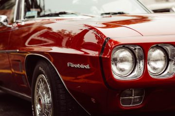 Ford Cherry red firebird. Photo by David Straight on Unsplash